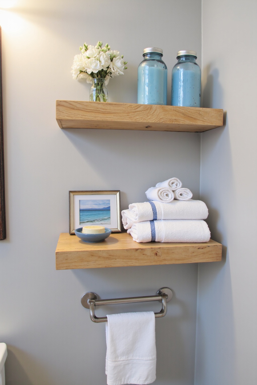 restroom decor, bathroom design decor, half bath over toilet decor, bathroom decor on shelves, shower shelf decor