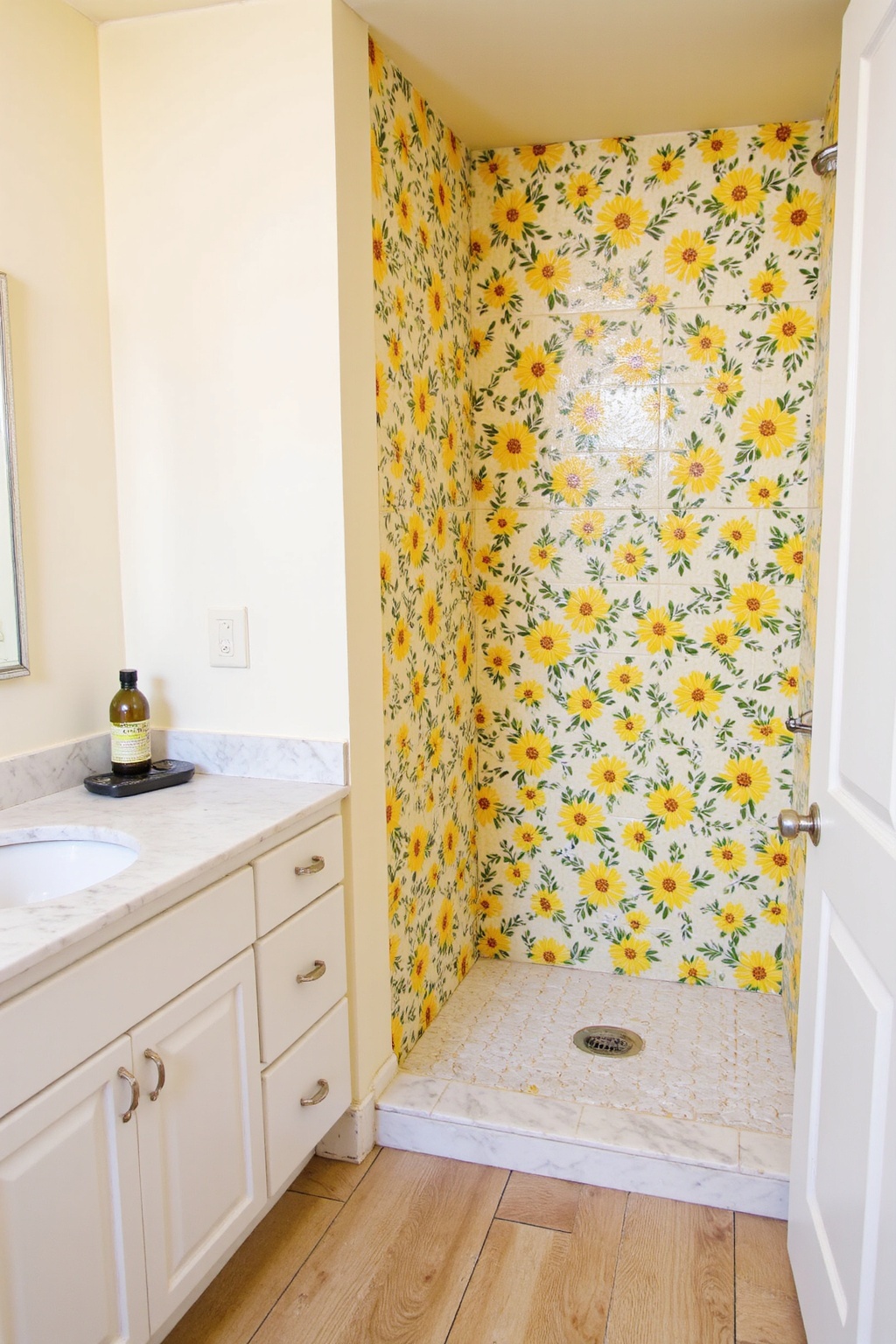 house bathroom, bathroom inspiration decor, pale blue bathroom tiles, green shower tile, colorful floor tile
